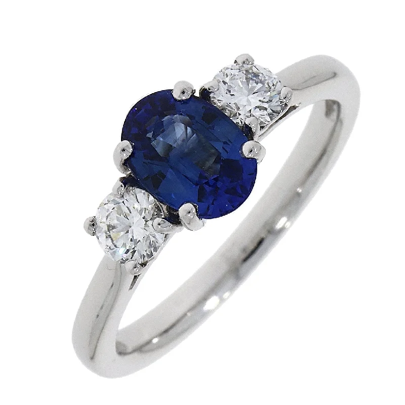 Platinum oval Sapphire and Diamond Claw Set Ring