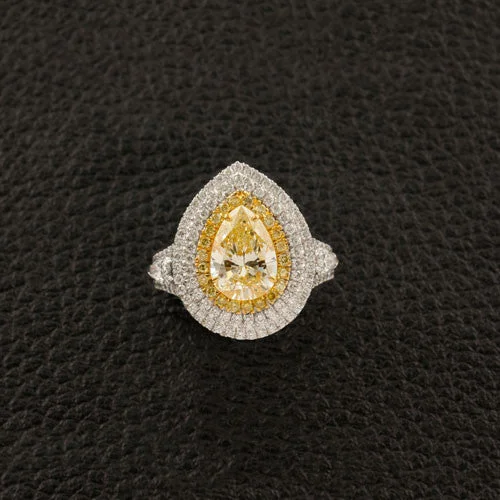 Pear shaped Yellow Diamond Ring