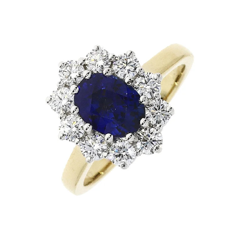 18ct yellow gold oval sapphire and round brilliant cut diamond claw set ring