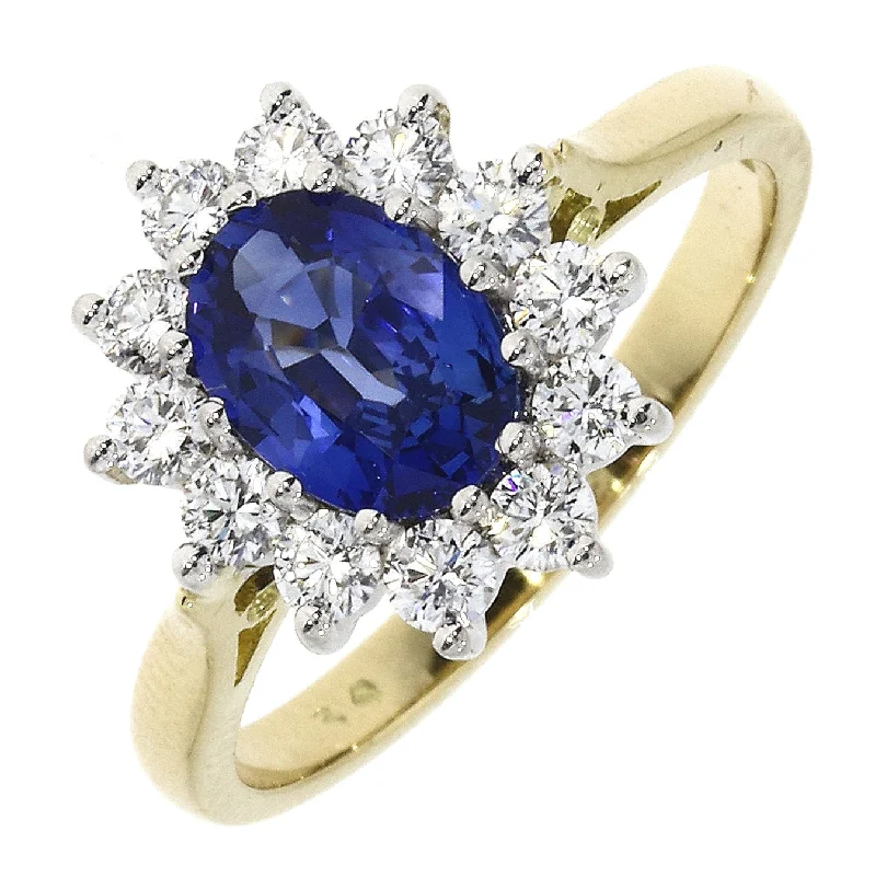 18ct yellow gold oval sapphire and round brilliant cut diamond claw set ring