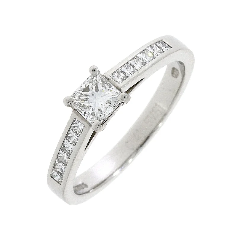 Platinum princess cut claw set diamond with channel set princess cut diamond shoulders ring