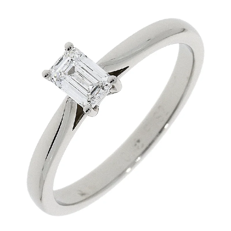 Platinum claw set emerald cut Diamond solitaire ring